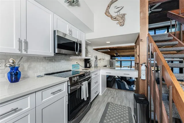 a bed room with a bed and a window