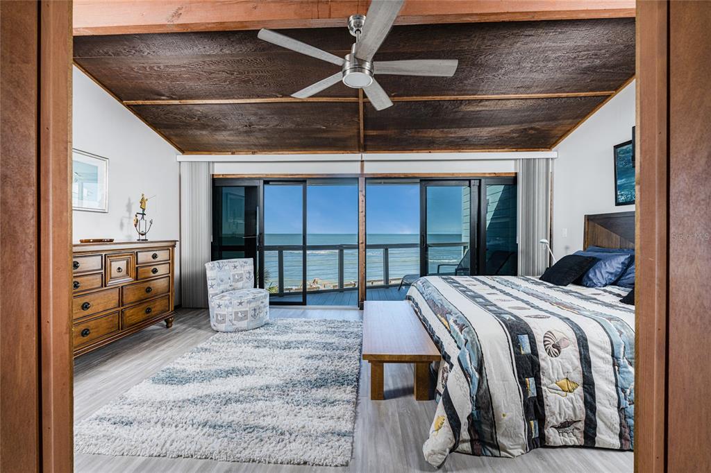 5030 North Beach Road, Unit 3 Englewood, FL 34223 - Photo 30 of 67 a bed room with a bed and a window