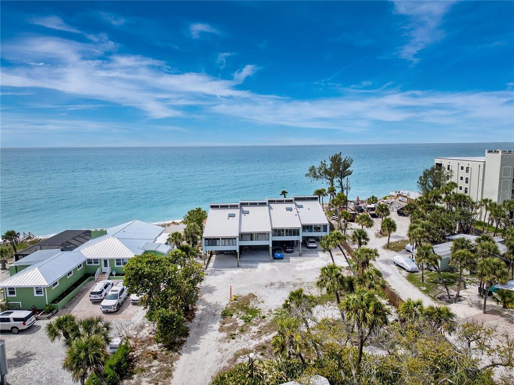 5030 North Beach Road, Unit 3 Englewood, FL 34223 - Photo 59 of 67 an aerial view of a house with a yard