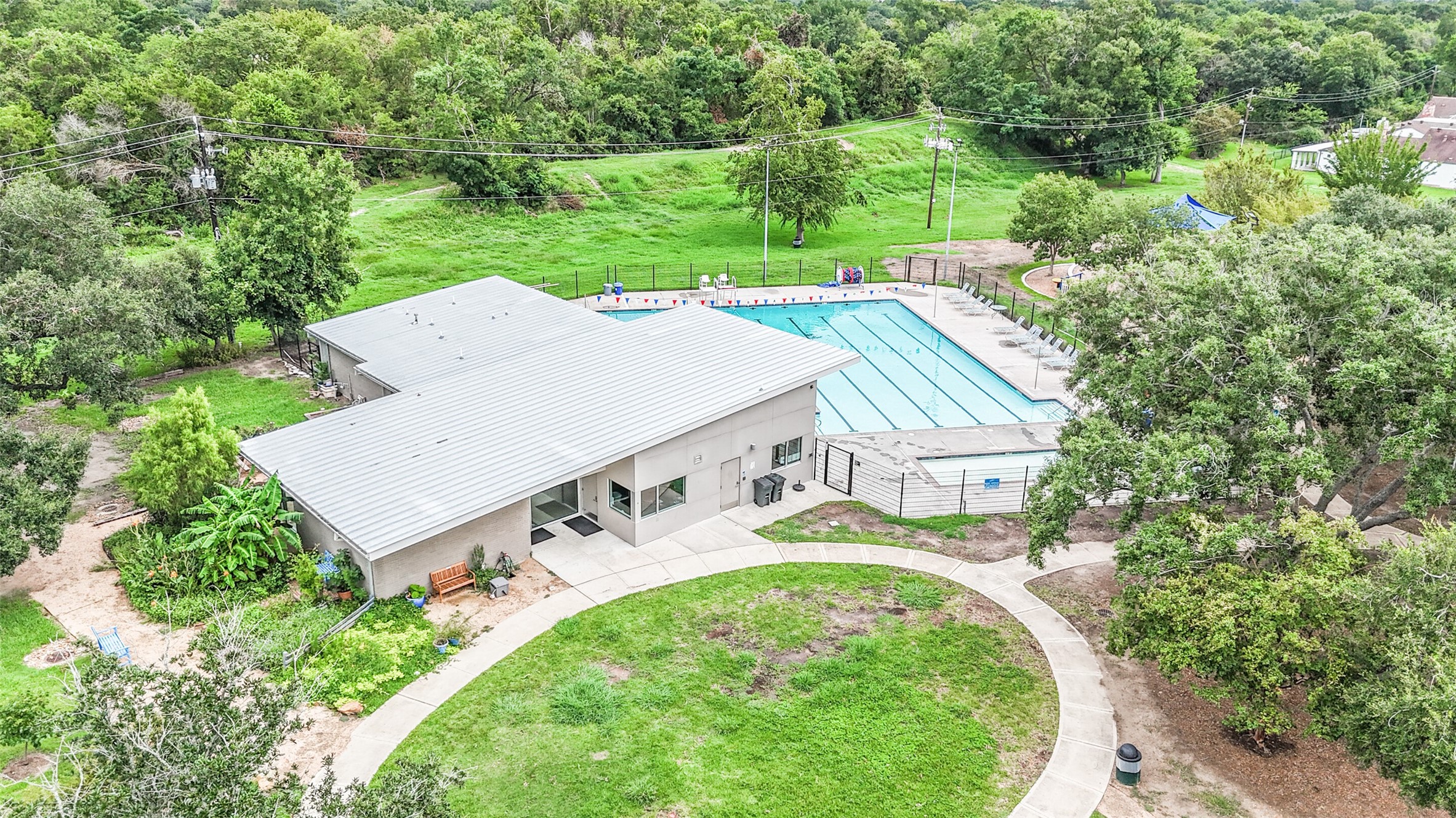 1007 Arrow Hill Road Houston, TX 77077 - Photo 41 of 48 There are many amenities for
Briarhills neighborhood such as
pool, clubhouse, playground,
tennis courts and basketball
court.