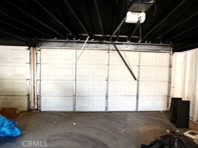 a view of a room with wooden walls