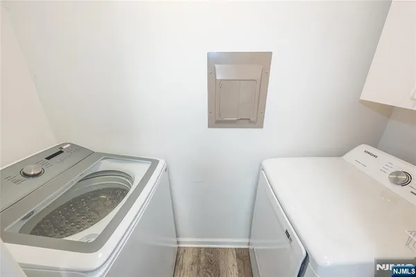 a utility room with dryer and washer