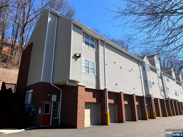 a view of a back yard of the house