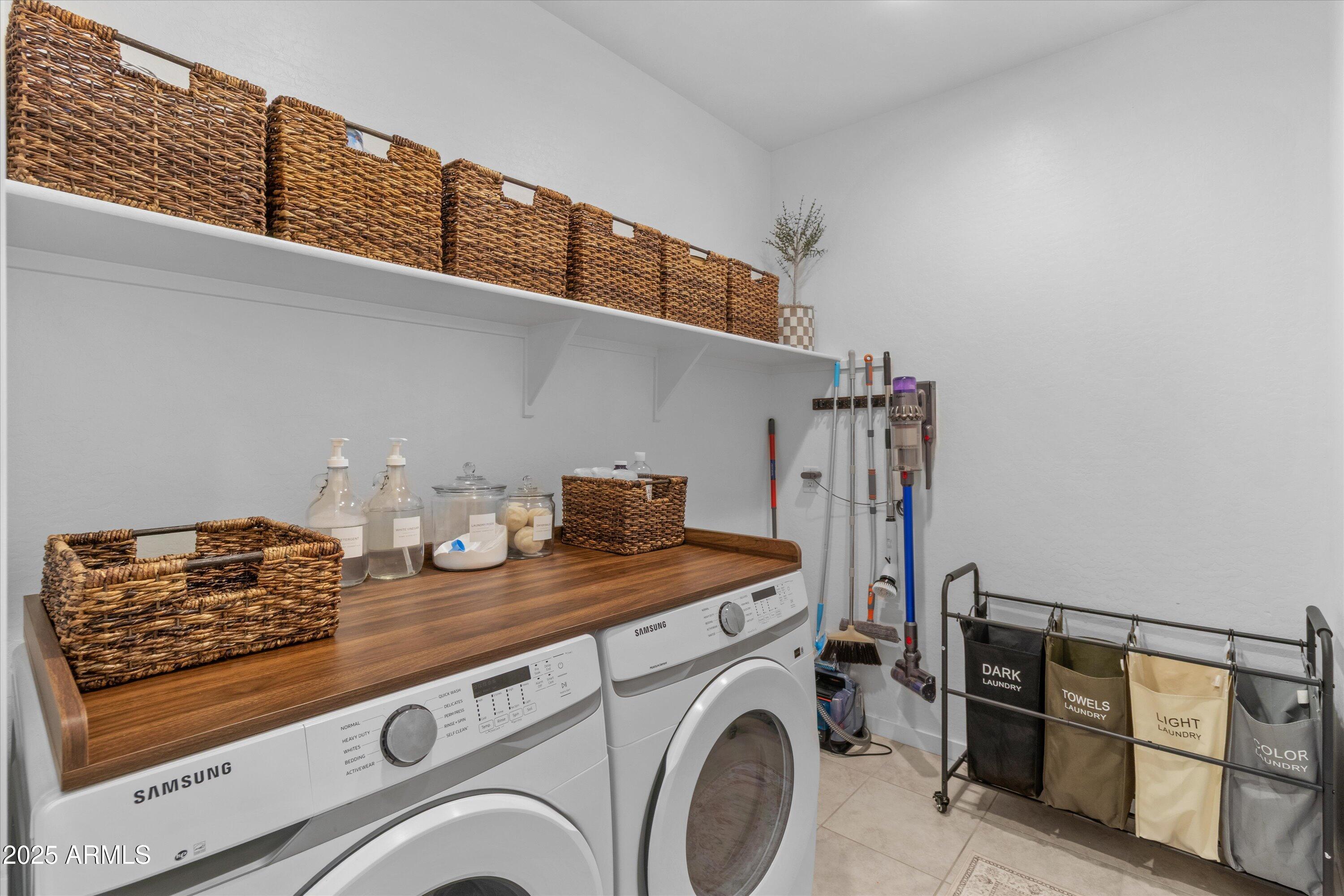 17970 West Pierson Street Goodyear, AZ 85395 - Photo 20 of 66 a utility room with dryer and washer