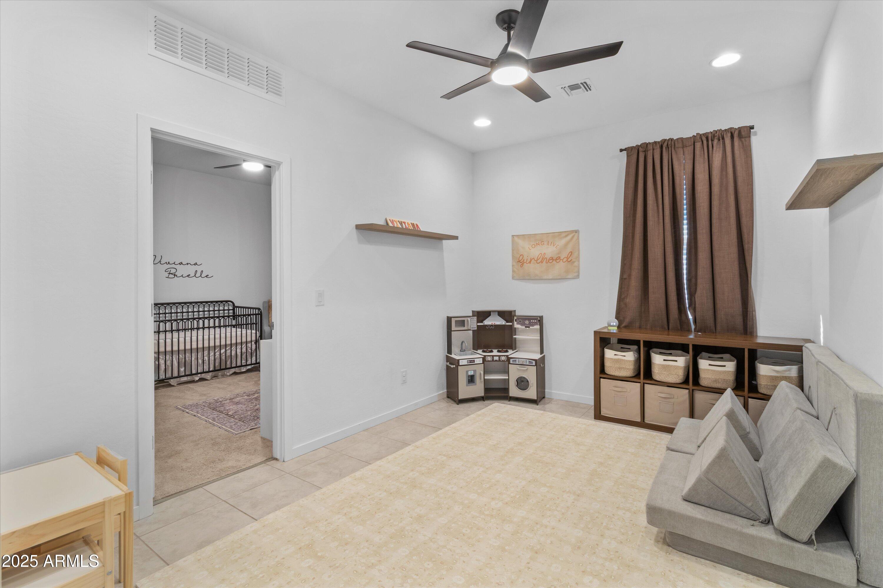 17970 West Pierson Street Goodyear, AZ 85395 - Photo 22 of 66 a view of livingroom with furniture and natural light