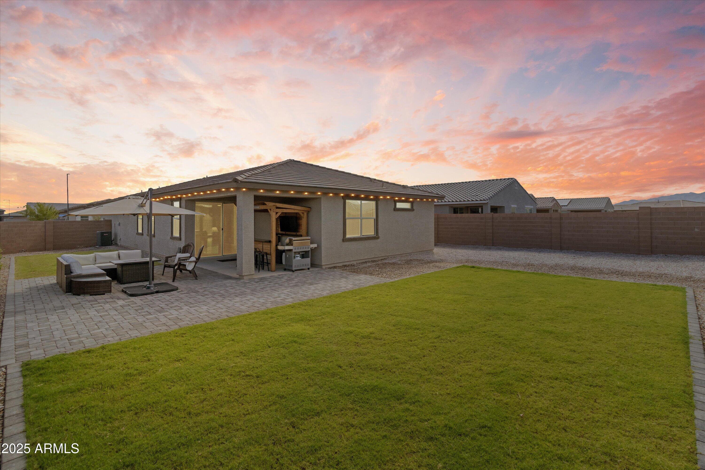17970 West Pierson Street Goodyear, AZ 85395 - Photo 3 of 66 a view of a house with a backyard
