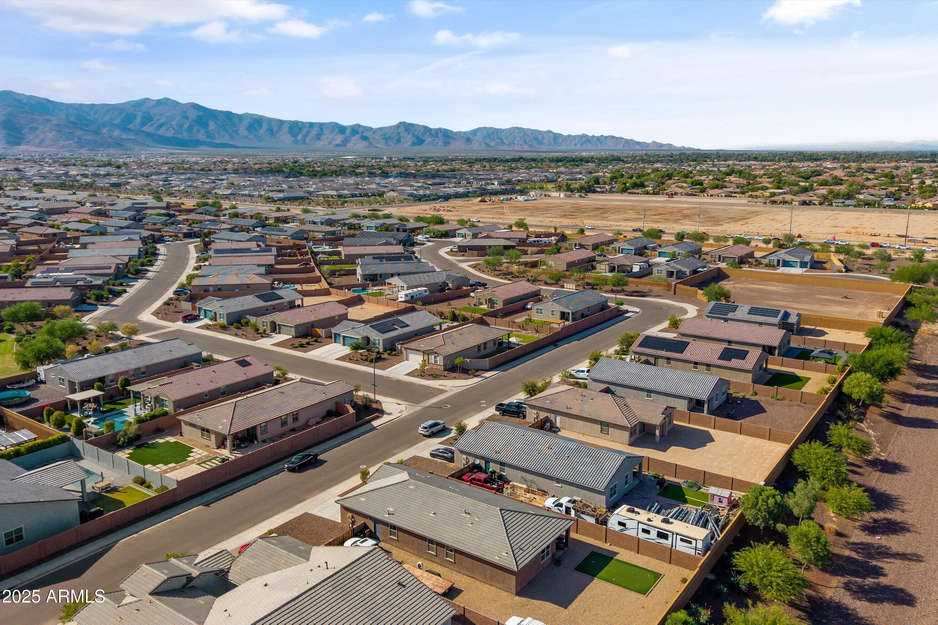 17970 West Pierson Street Goodyear, AZ 85395 - Photo 53 of 66 an aerial view of residential house and lake view