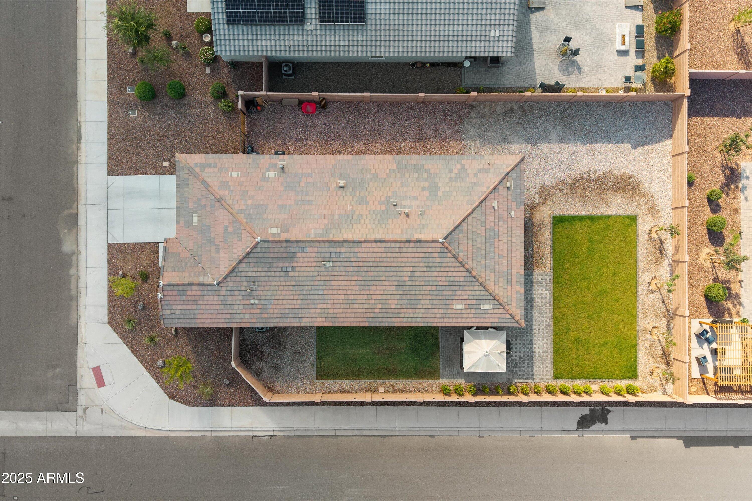 17970 West Pierson Street Goodyear, AZ 85395 - Photo 56 of 66 an aerial view of a house with a swimming pool