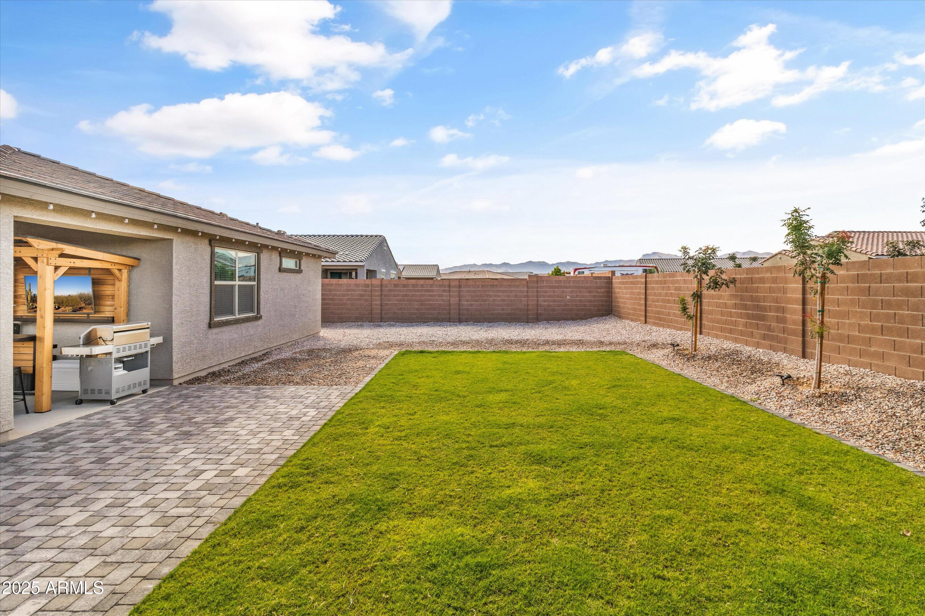 17970 West Pierson Street Goodyear, AZ 85395 - Photo 60 of 66 a view of swimming pool with a yard