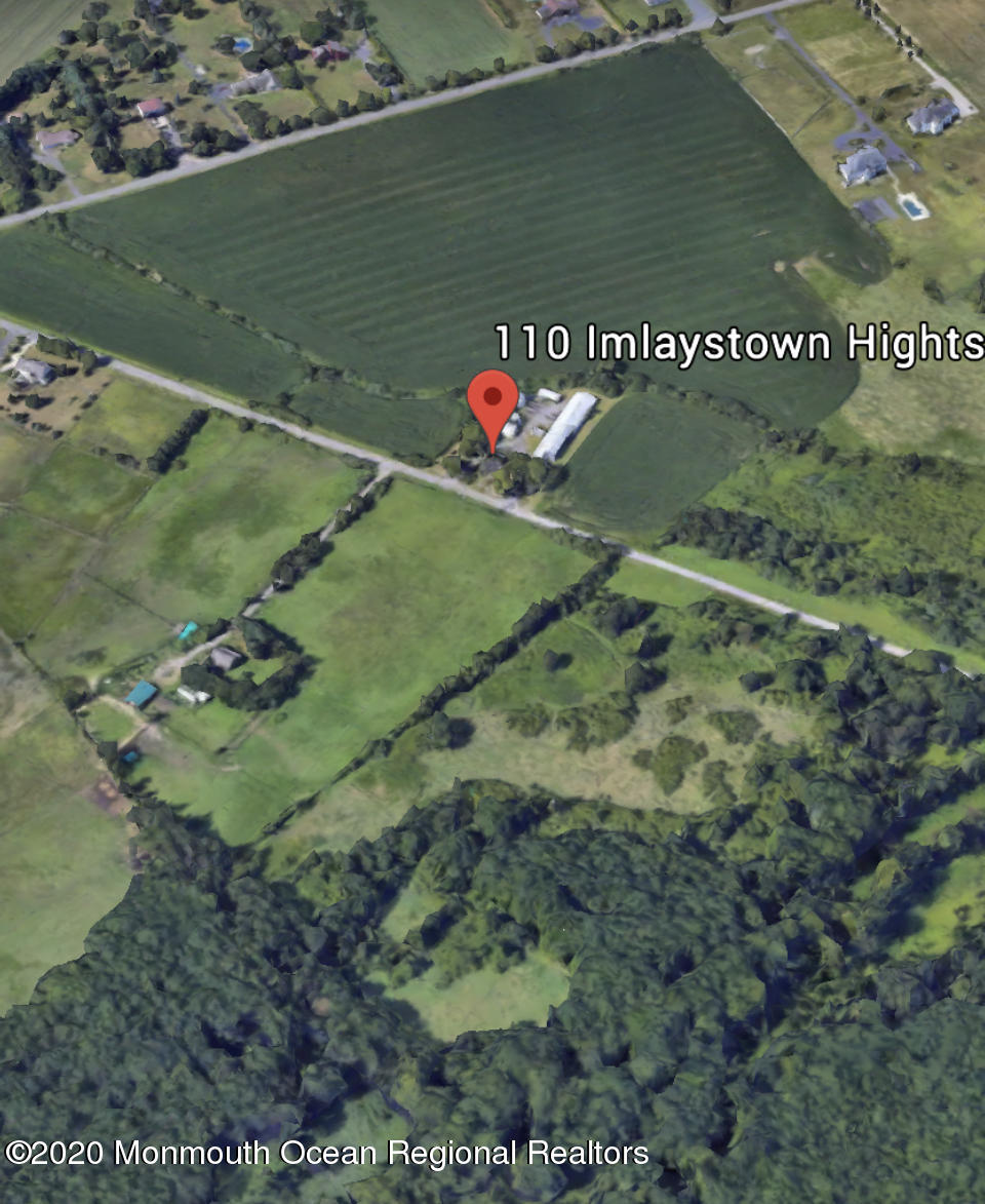 110 Imlaystown Hightstown Road Robbinsville, NJ 08691 - Photo 16 of 25 a view of a swimming pool with a yard