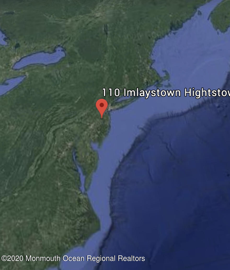 110 Imlaystown Hightstown Road Robbinsville, NJ 08691 - Photo 5 of 25 a view of a book and a yard in back