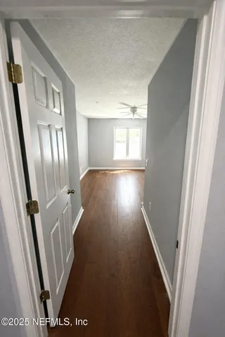 a view of a backyard of the house