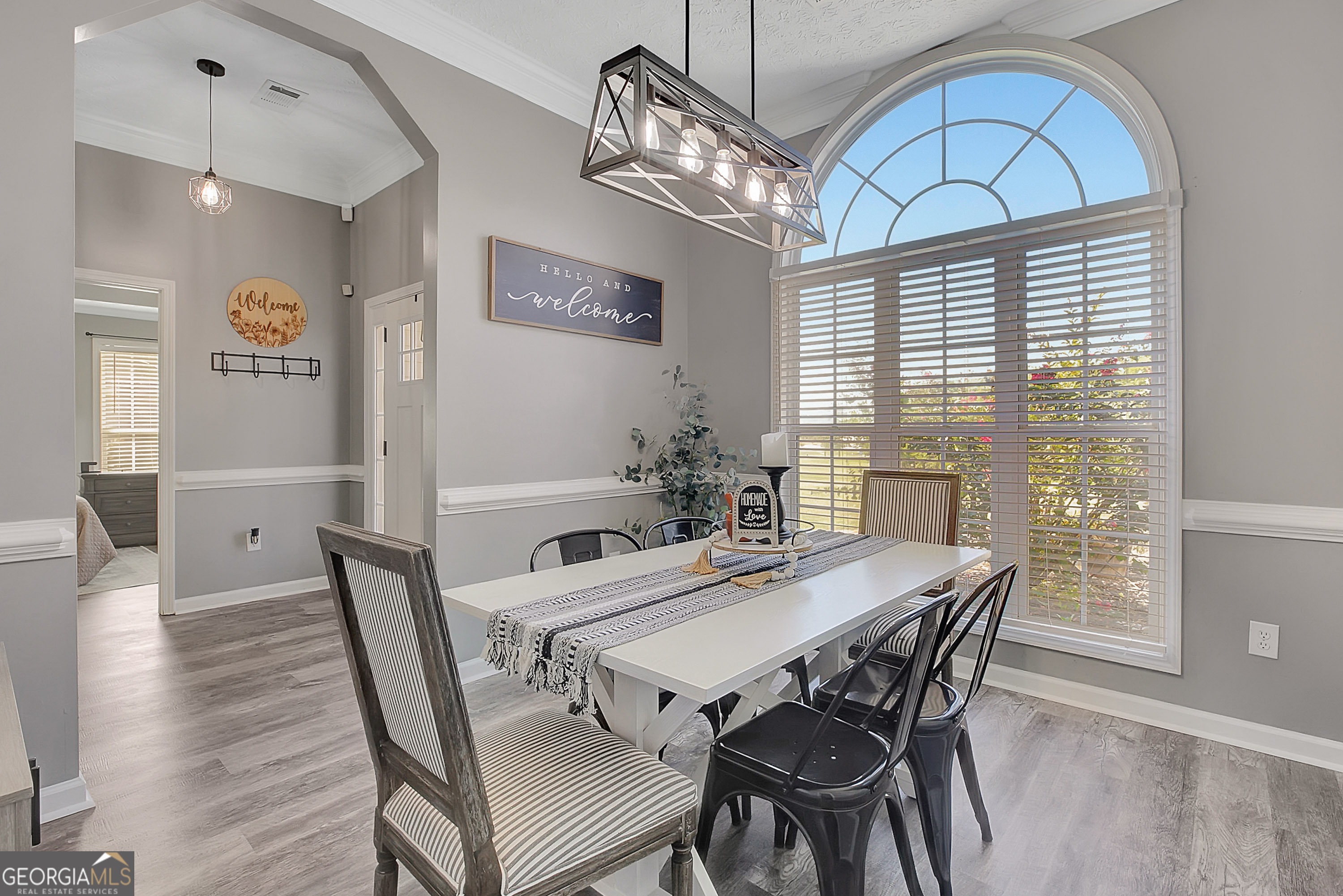 229 John Lovelace Road LaGrange, GA 30241 - Photo 9 of 59 a view of a dining room with furniture window and wooden floor