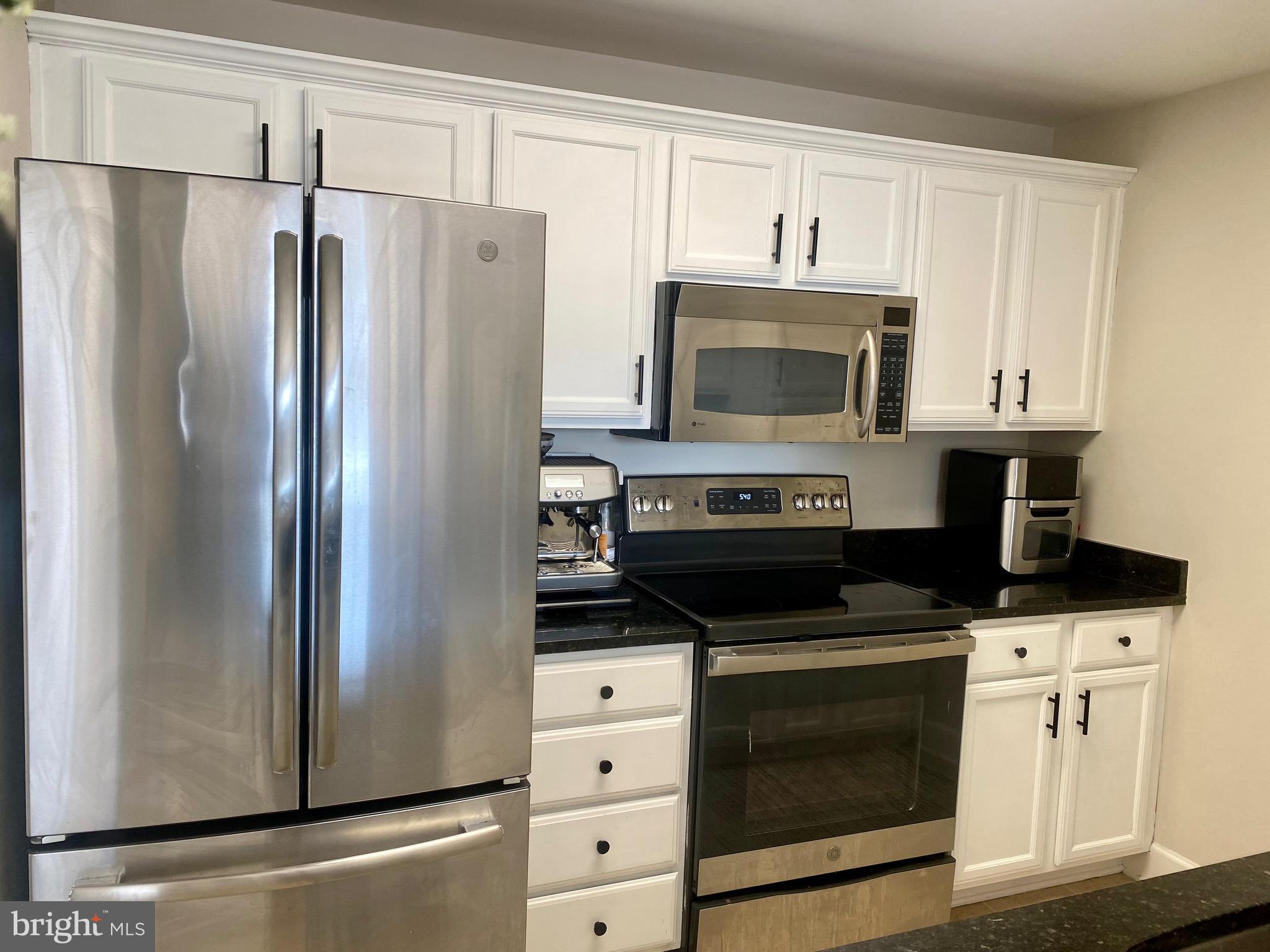 11800 Sunset Hills Road, Unit 1211 Reston, VA 20190 - Photo 21 of 37 FRENCH DOOR FRIG & ICE MAKER