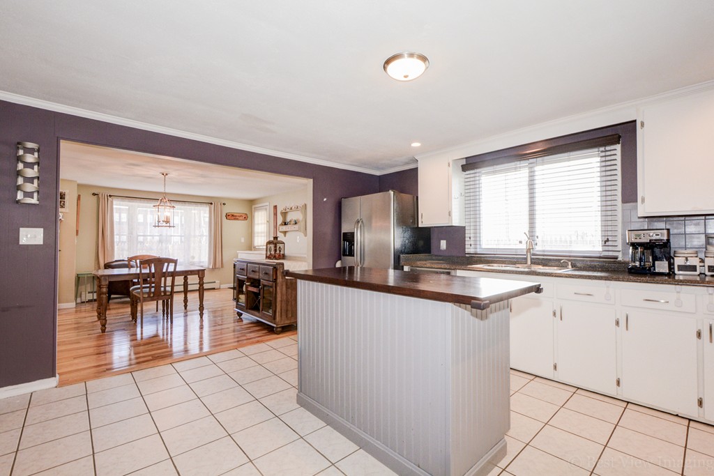 854 Boston Road Billerica, MA 01821 - Photo 15 of 30 a kitchen with cabinets a sink and appliances