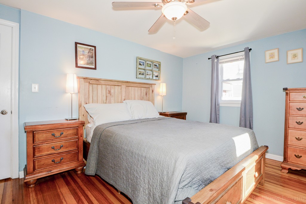 854 Boston Road Billerica, MA 01821 - Photo 18 of 30 a bedroom with a bed and a dresser