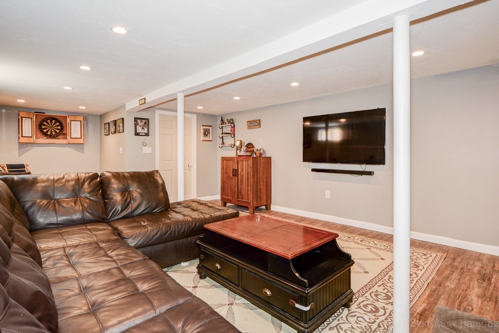 854 Boston Road Billerica, MA 01821 - Photo 26 of 30 a living room with furniture and a flat screen tv