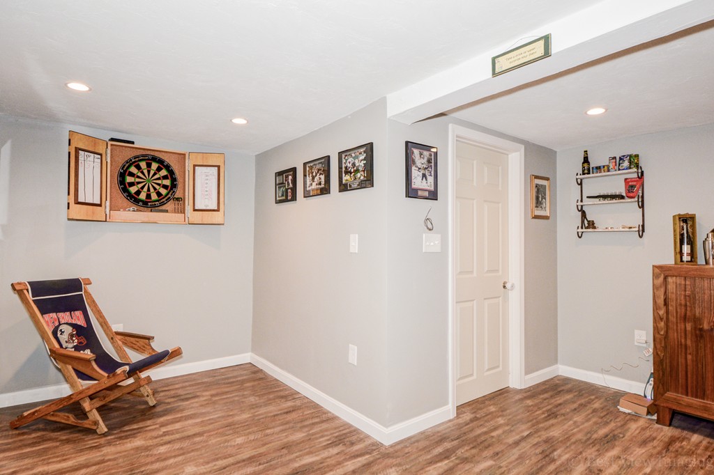 854 Boston Road Billerica, MA 01821 - Photo 27 of 30 a view of a workspace with furniture and wooden floor