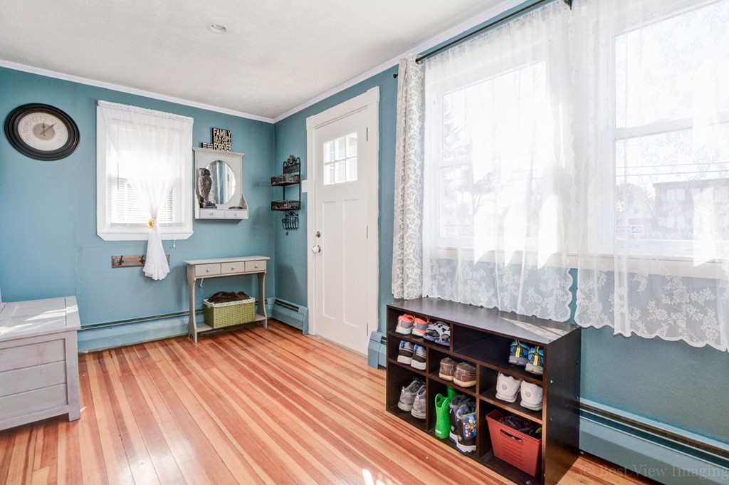 854 Boston Road Billerica, MA 01821 - Photo 3 of 30 a living room with furniture and a wooden floor