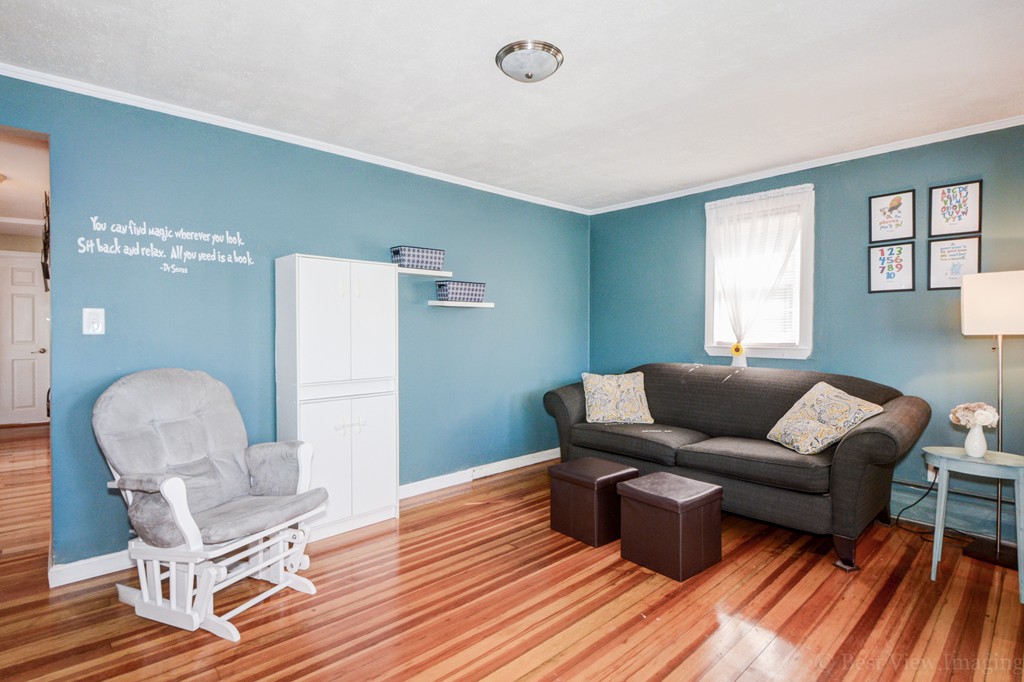 854 Boston Road Billerica, MA 01821 - Photo 5 of 30 a living room with furniture and a wooden floor
