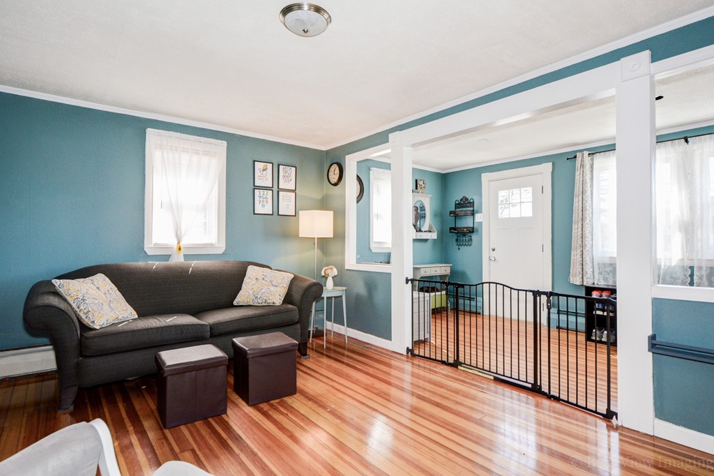 854 Boston Road Billerica, MA 01821 - Photo 8 of 30 a living room with furniture and a wooden floor