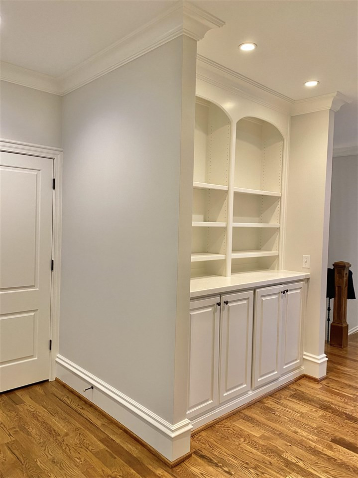 526 Wayne Drive Raleigh, NC 27608 - Photo 24 of 30 Beautiful custom shelving to display all of your special pictures, artwork, or books! Cabinets below for extra storage space! Upstairs Hallway