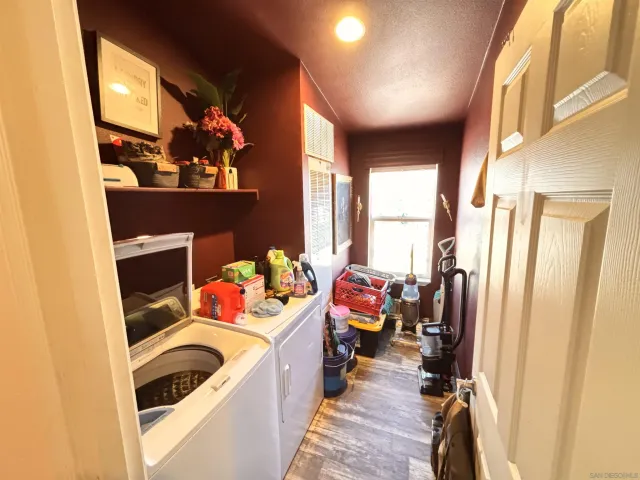 a bedroom with furniture and a gym equipment