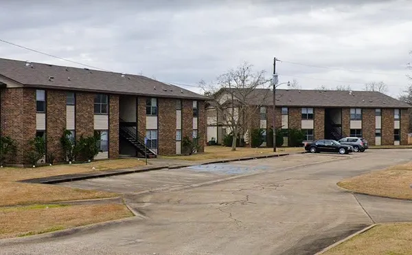 a view of a building with a patio