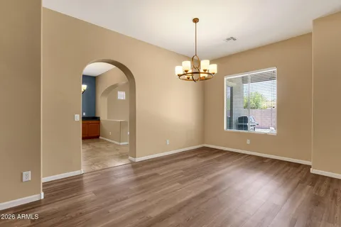 a view of livingroom with window and wooden floor