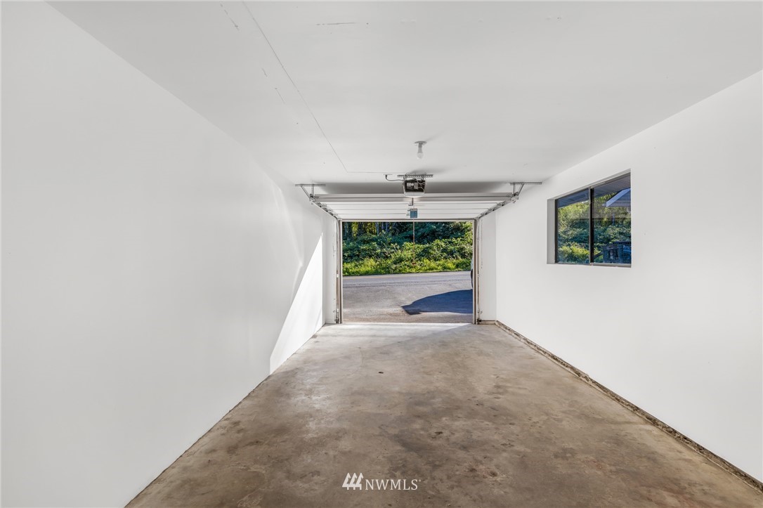 20512 Filbert Drive Bothell, WA 98012 - Photo 18 of 27 a view of a white room with a large window