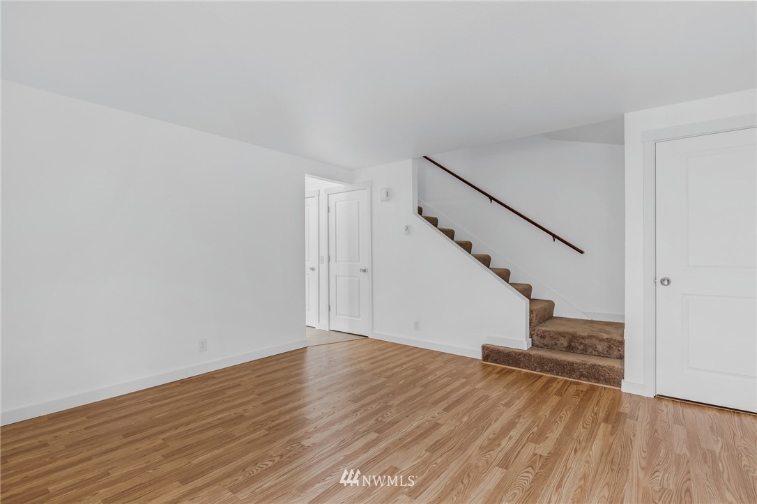 20512 Filbert Drive Bothell, WA 98012 - Photo 6 of 27 a view of entryway and hall with wooden floor