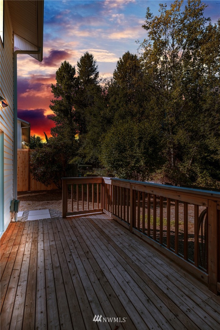 20512 Filbert Drive Bothell, WA 98012 - Photo 10 of 27 a view of balcony with wooden floor and fence