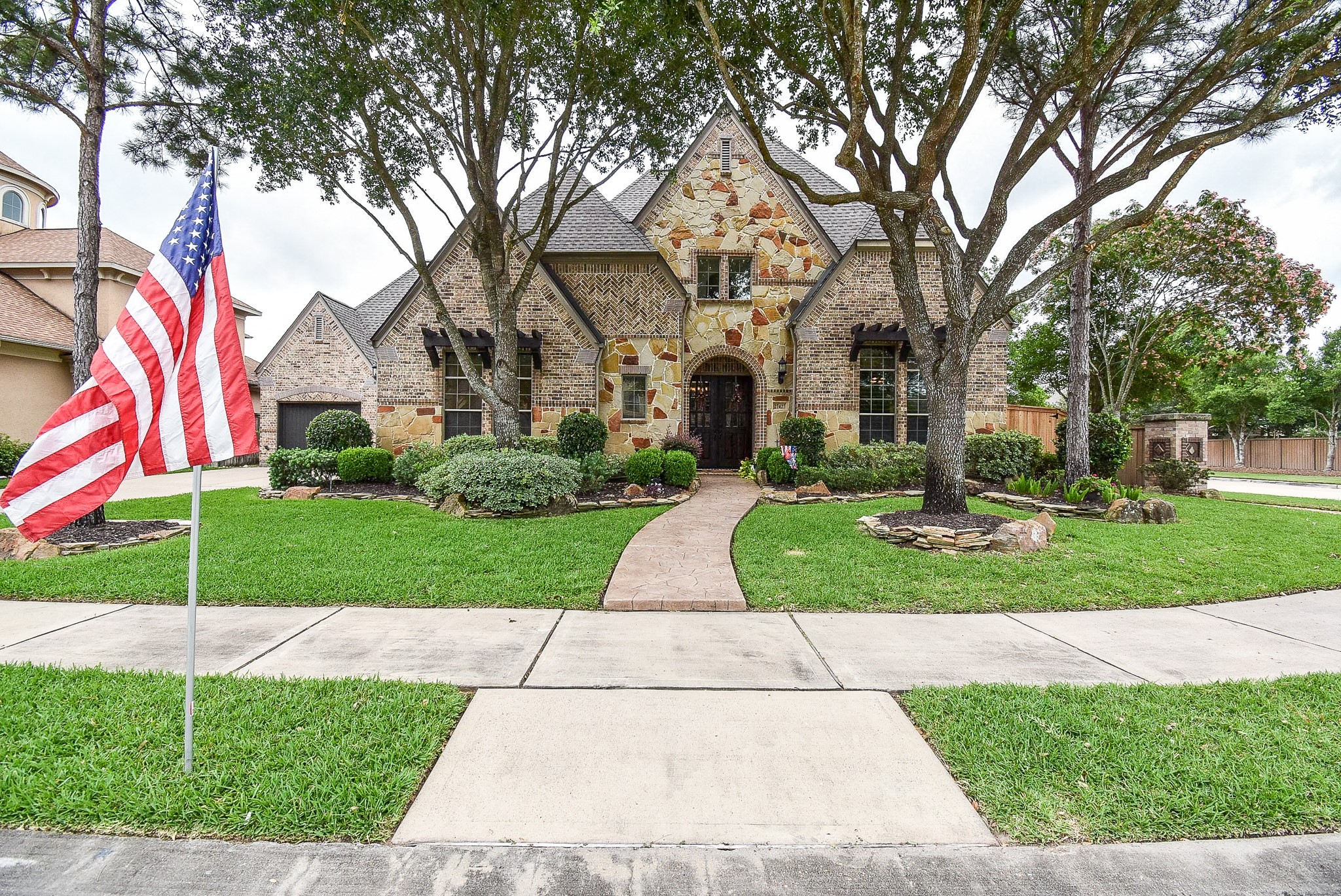 27427 Guthrie Ridge Lane Katy, TX 77494 - Photo 1 of 48 a view of a white house with a yard and large tree