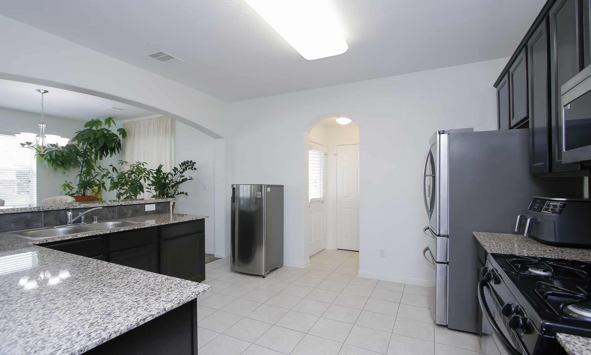 10516 Primo Place Spring, TX 77379 - Photo 12 of 34 Granite countertops. Refrigerator excluded.