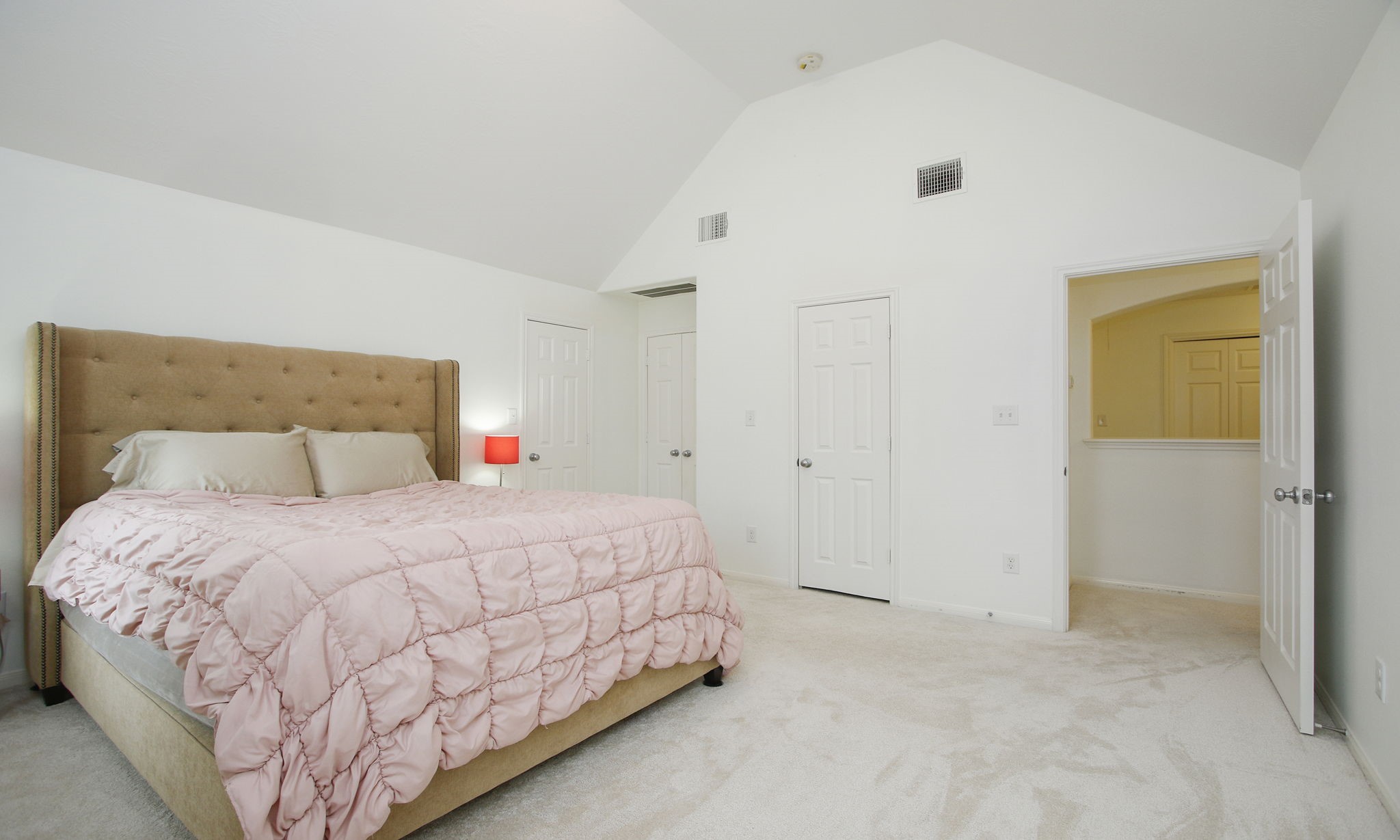 10516 Primo Place Spring, TX 77379 - Photo 16 of 34 Primary bedrrom have the double doors to the primary bath