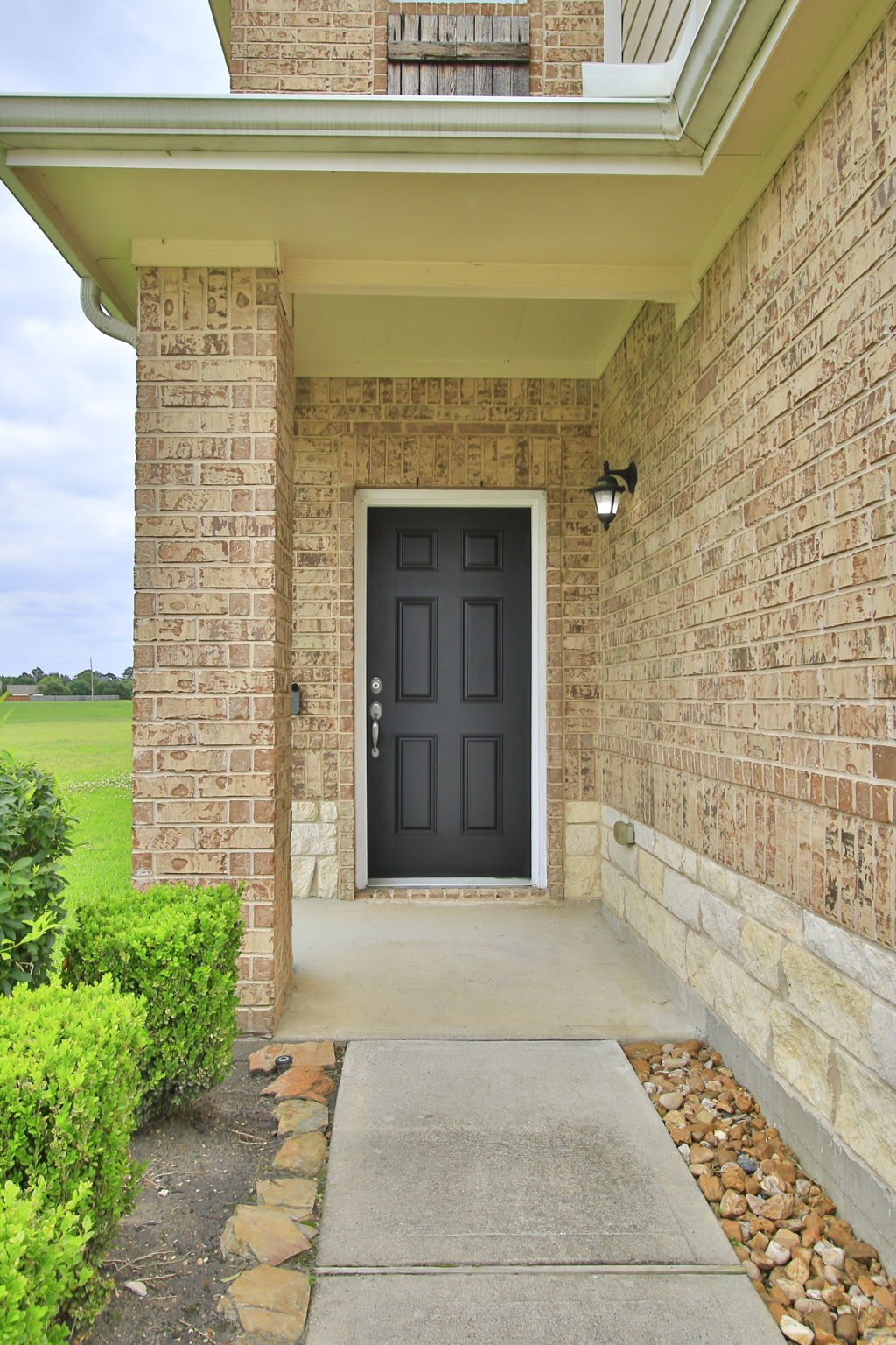 10516 Primo Place Spring, TX 77379 - Photo 3 of 34 Brick and stone exterior. Covered front porch.