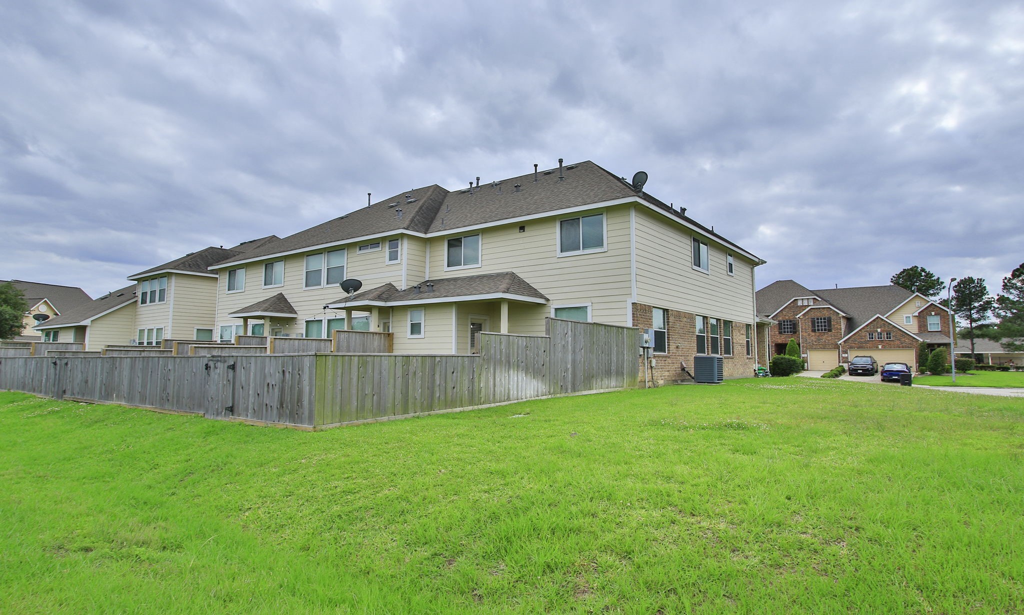 10516 Primo Place Spring, TX 77379 - Photo 4 of 34 The 3 BR is a highly sought end unit. HOA maintains the lawn and outside maintenance including the roof