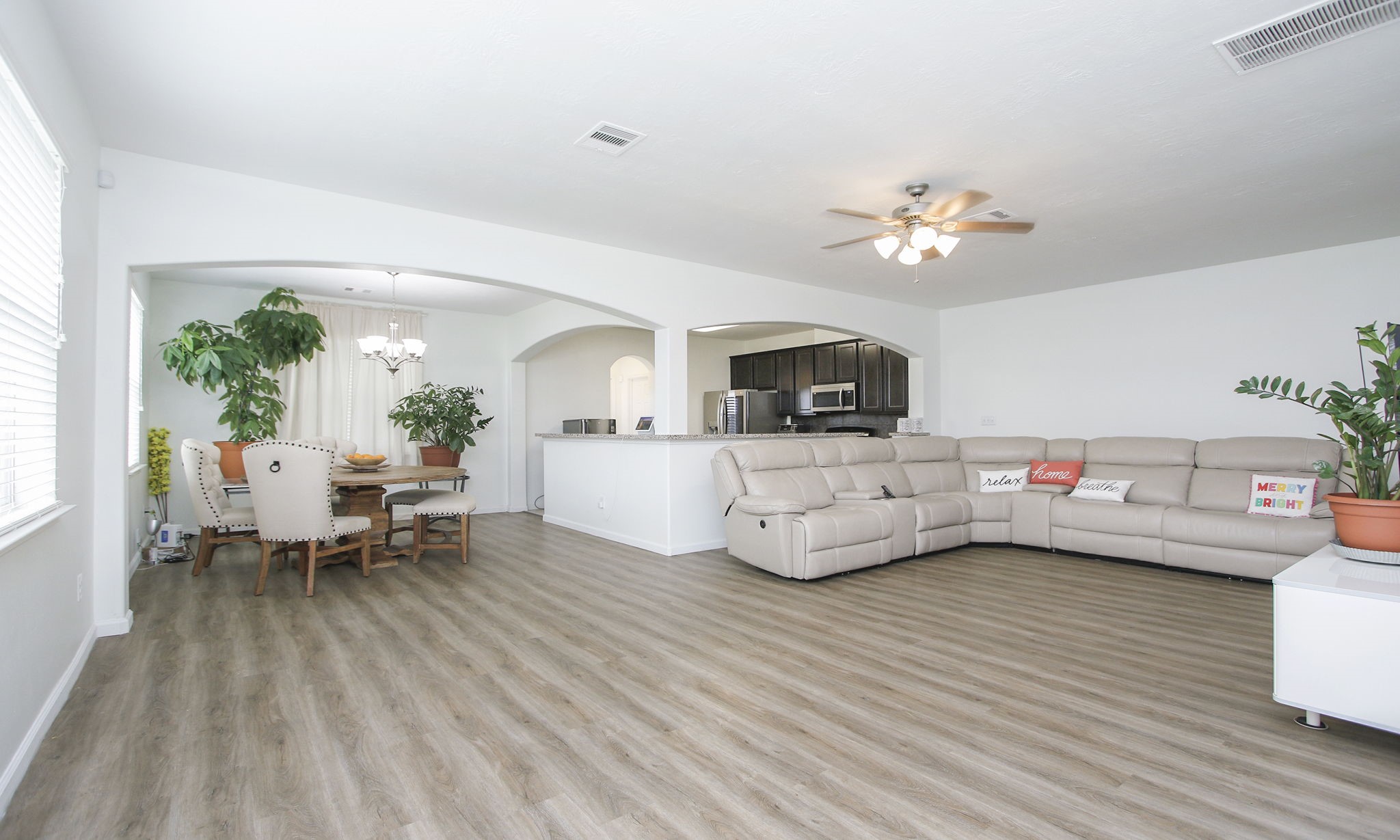 10516 Primo Place Spring, TX 77379 - Photo 6 of 34 Great options for furniture placement. Fan with light kit.
