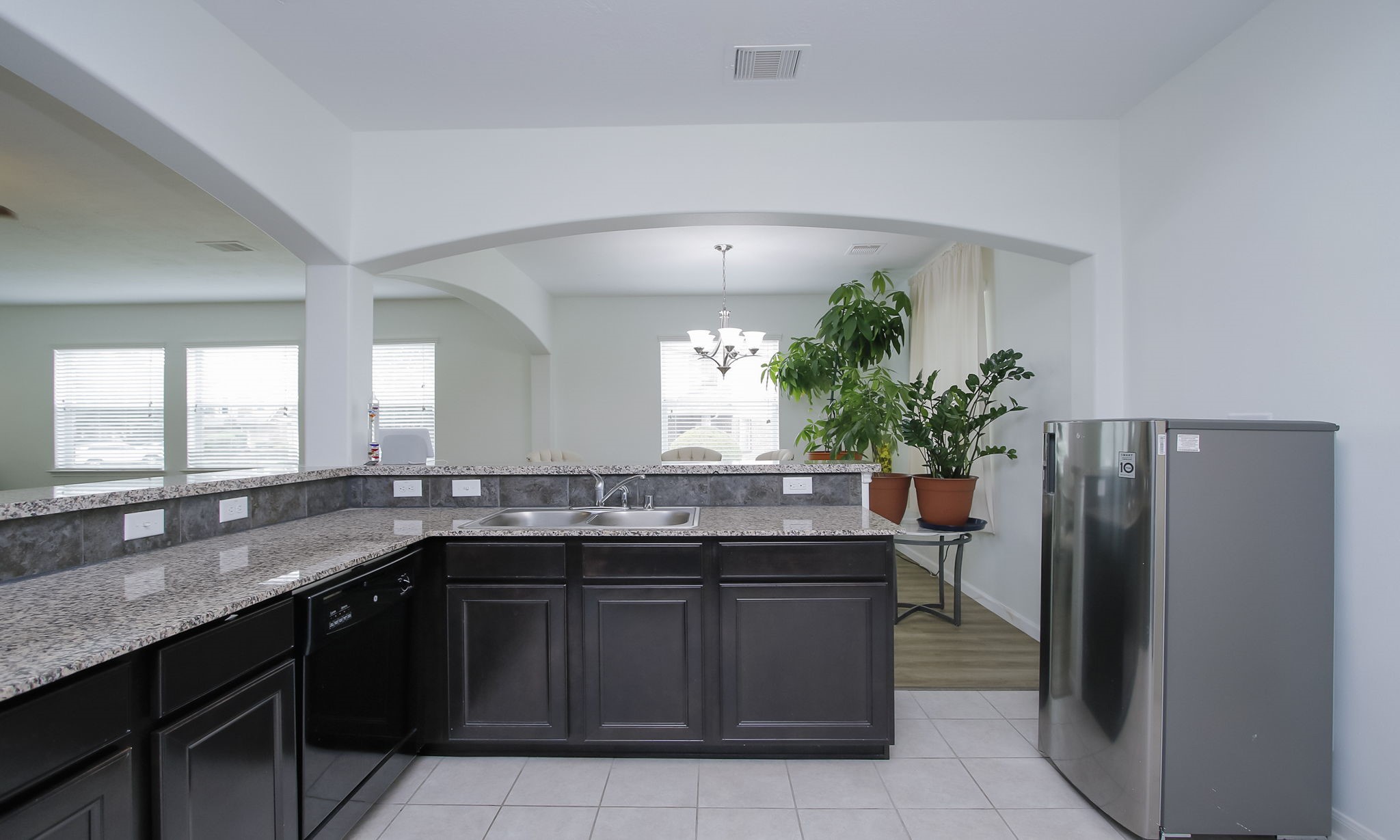 10516 Primo Place Spring, TX 77379 - Photo 8 of 34 Plenty of counter space and counter top seating