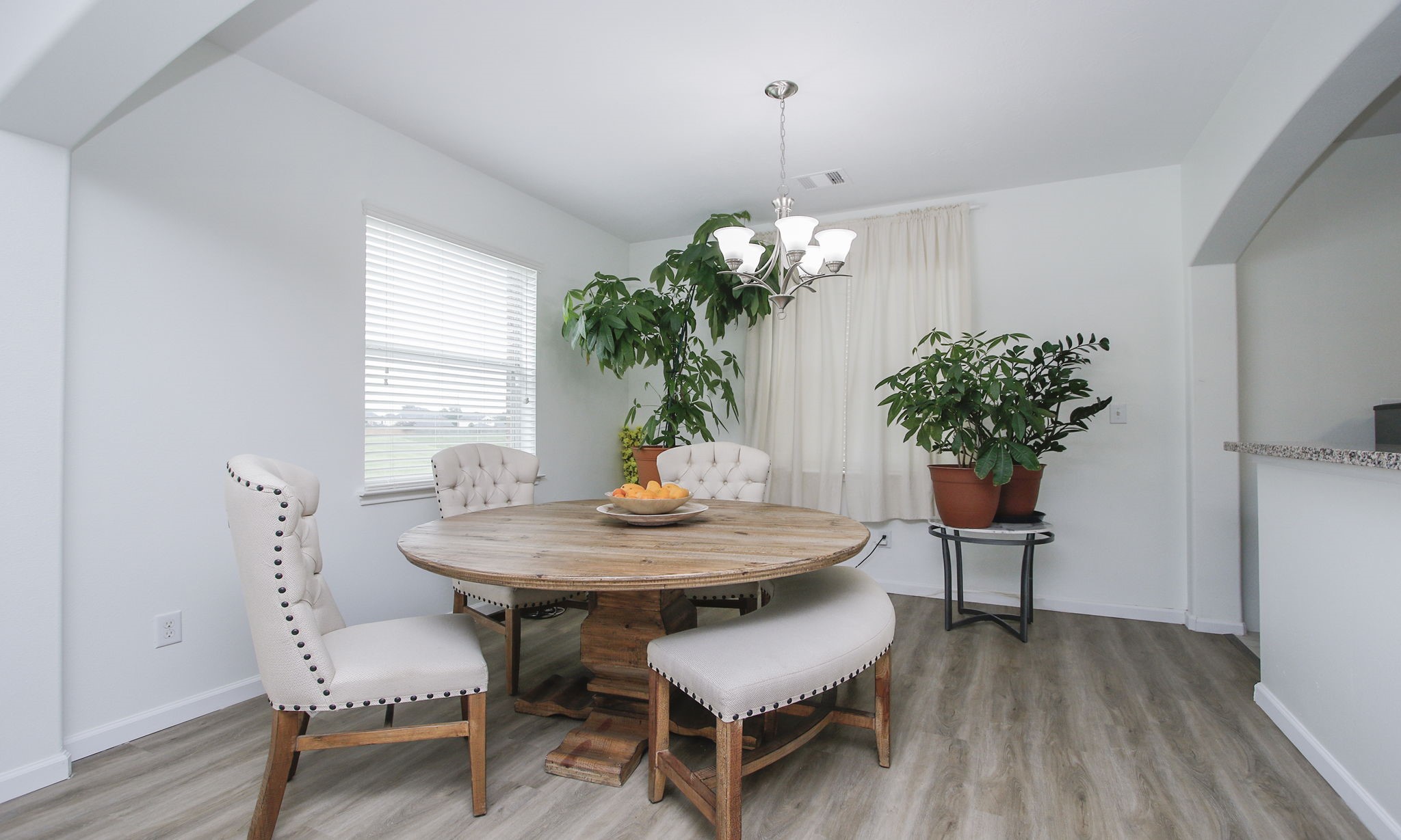 10516 Primo Place Spring, TX 77379 - Photo 9 of 34 Cozy breakfast nook with entrance to kitchen area.