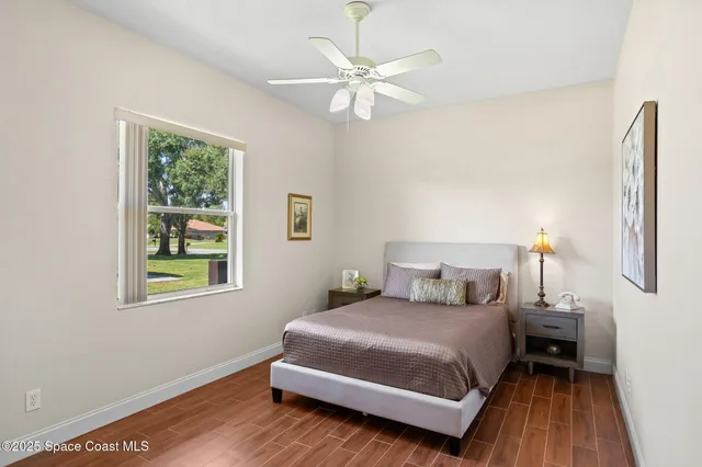 a spacious bathroom with a bathtub and shower