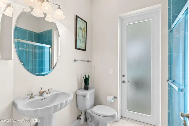 a view of a house with swimming pool and sitting area