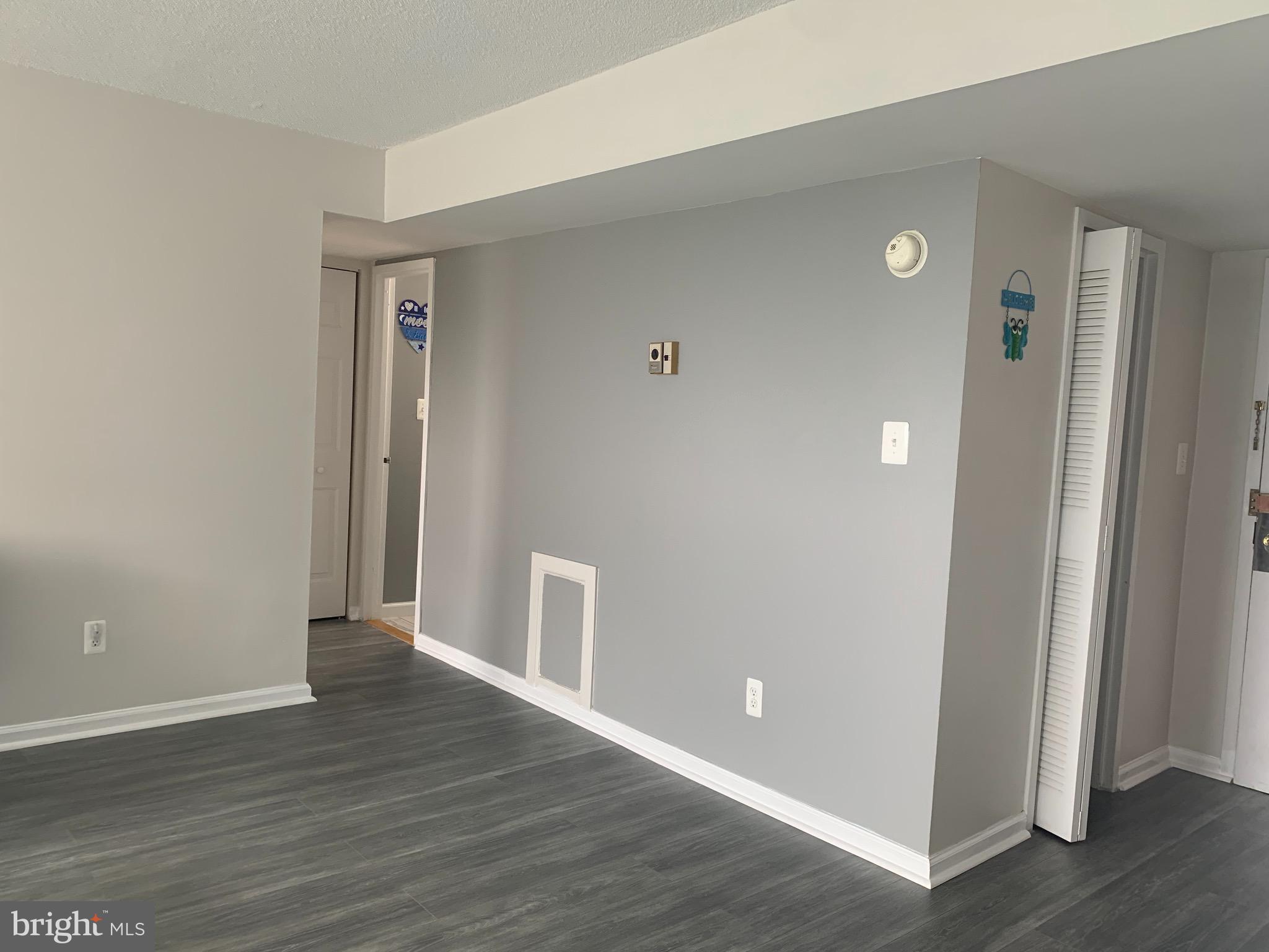 1836 Metzerott Road, Unit 1706 Adelphi, MD 20783 - Photo 4 of 44 LIVING ROOM NEW LAMINATE FLOORS