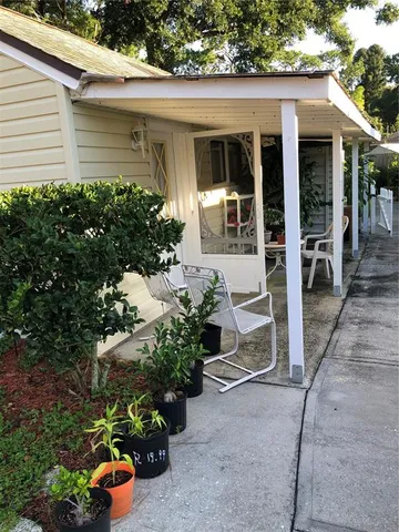 a front view of a house with a porch