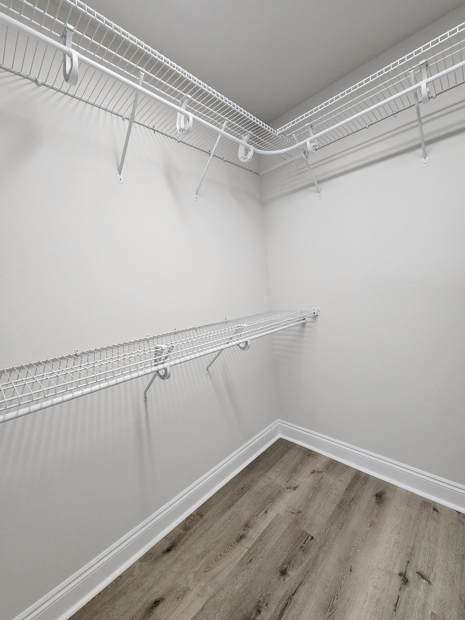 3168 Main Street Crestview, FL 32539 - Photo 13 of 18 a view of a room with racks on the wall