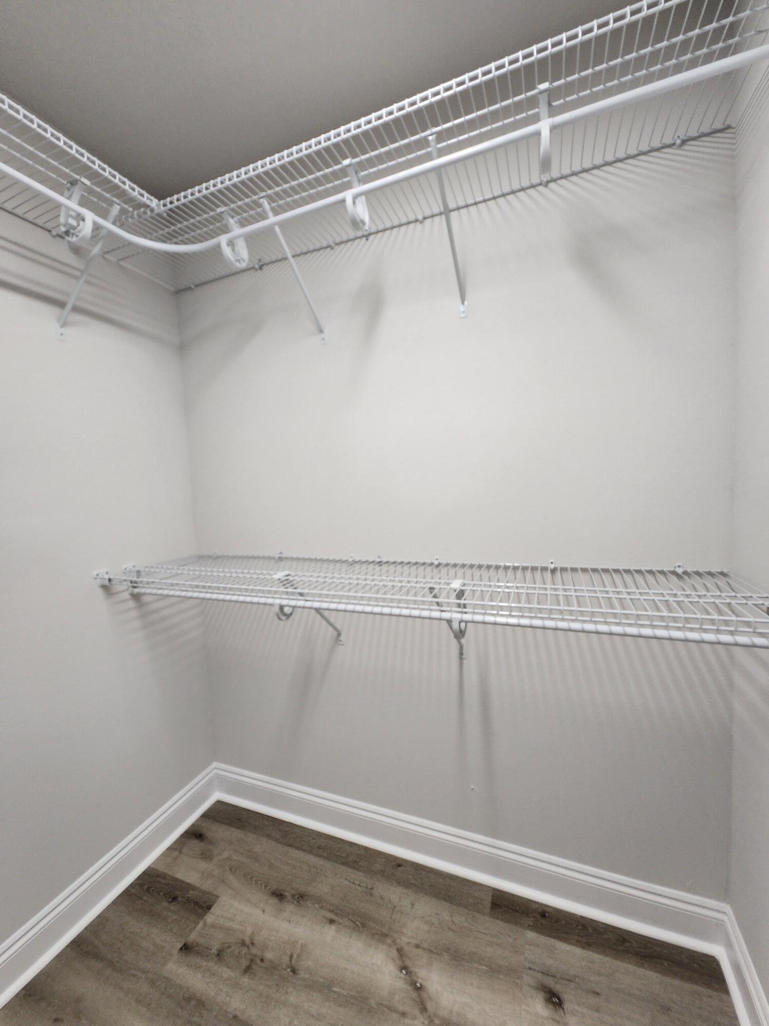 3168 Main Street Crestview, FL 32539 - Photo 14 of 18 a view of a room with racks on the wall
