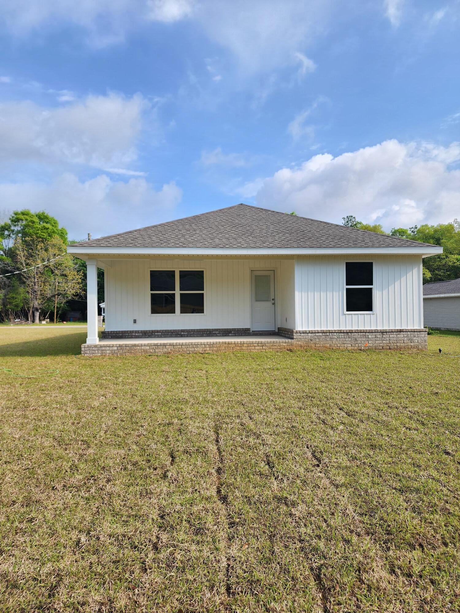 3168 Main Street Crestview, FL 32539 - Photo 2 of 18 a house with outdoor space