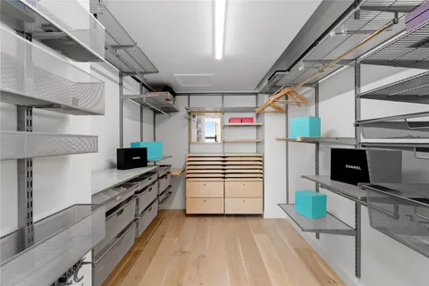 a en suite bathroom with a tub shower and bedroom view