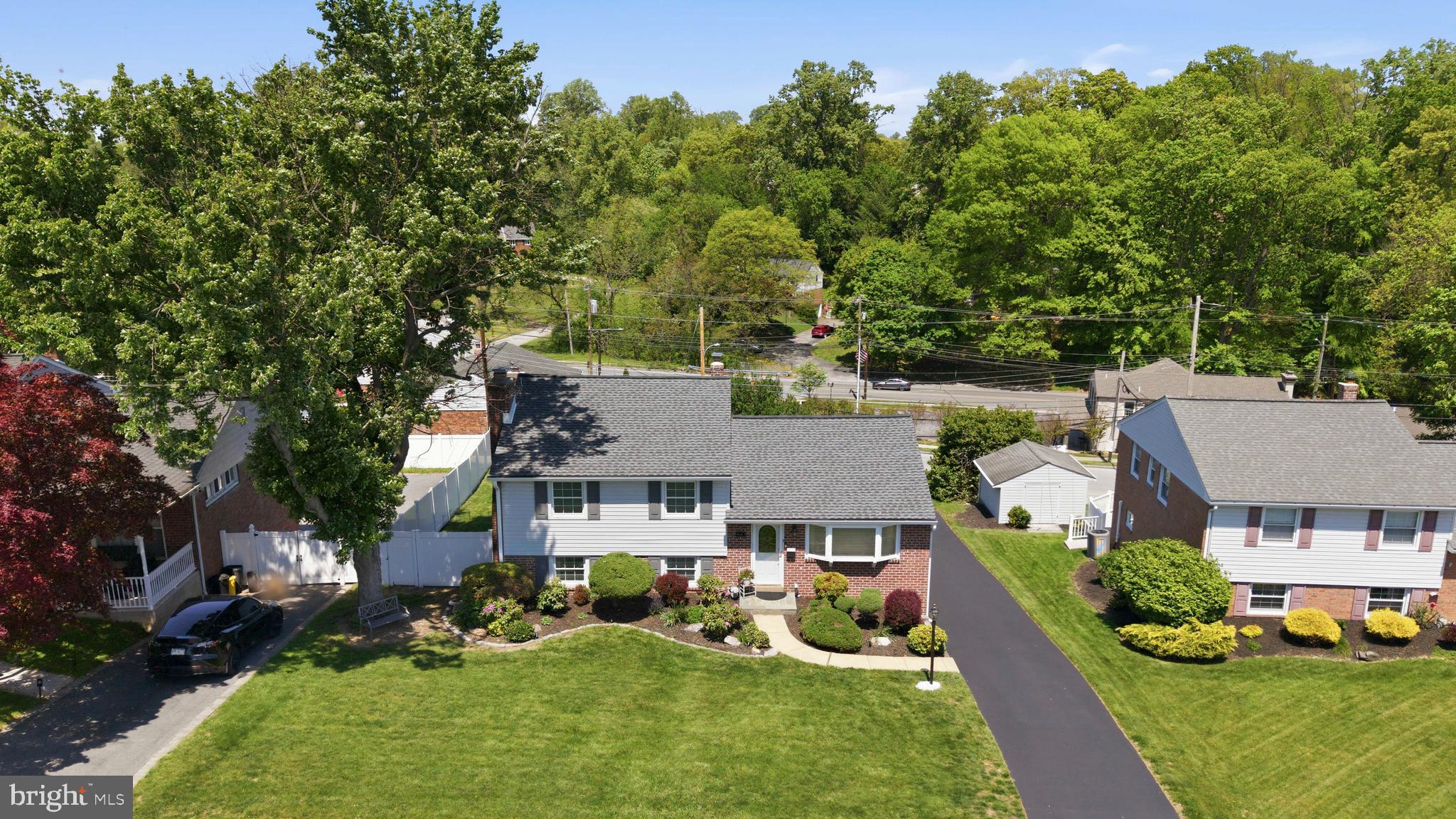 447 Maddock Road Springfield, PA 19064 - Photo 2 of 42 an aerial view of a house with swimming pool garden and patio