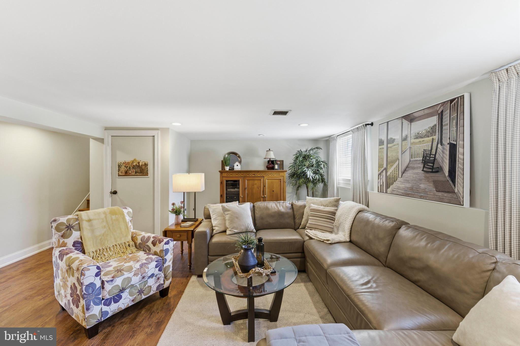 447 Maddock Road Springfield, PA 19064 - Photo 29 of 42 a living room with furniture and wooden floor